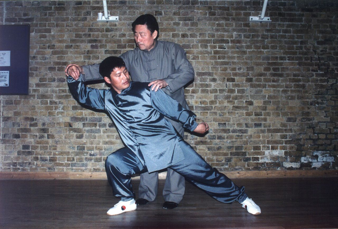 Shifu Liu with Grandmaster Chen Xiaowang in martial arts poses
